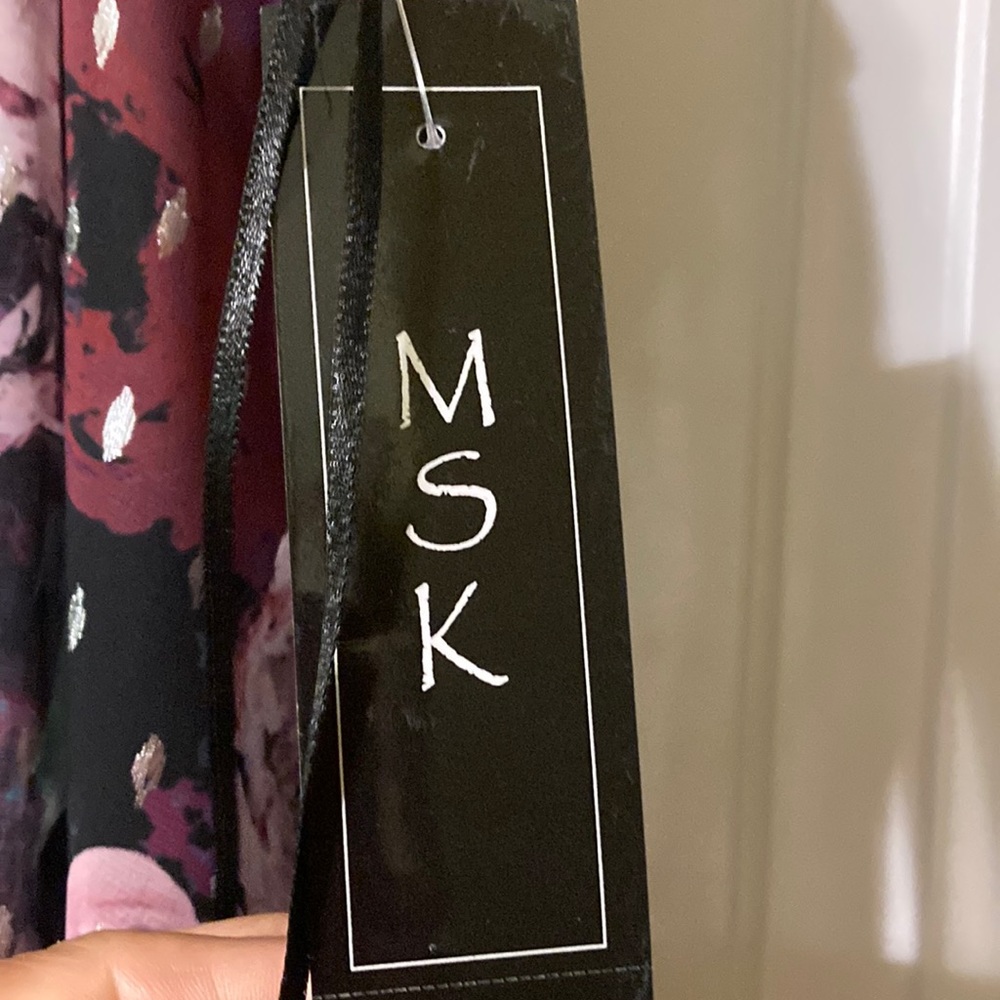 Still has tags never worn halter pants dress women’s size M